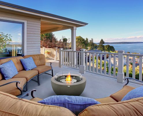 Modern outdoor fire features like vent-free outdoor fireplaces, gas fire bowls, and fire tables combine comfort, functionality, and industrial-inspired design.